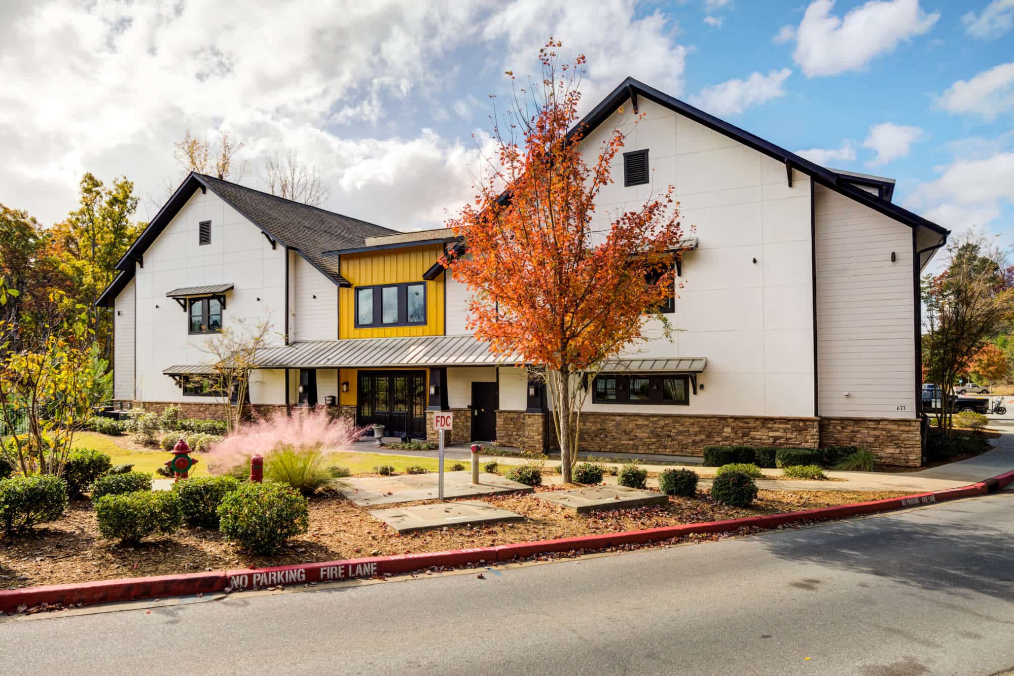 the collective at clemson off campus apartments near clemson university leasing office resident clubhouse main entrance building exterior
